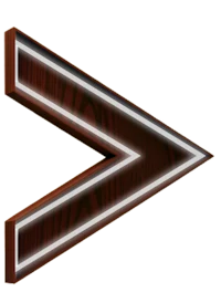 a wooden arrow pointing in the direction of a black background