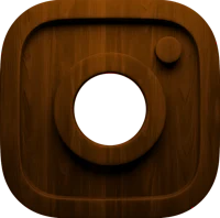 a wooden instagram icon on a black background