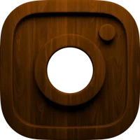a wooden instagram icon on a black background